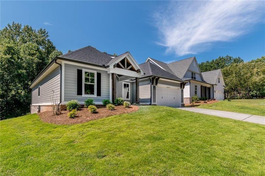 Front exterior of a new home in , Gainesville, GA, highlighting curb appeal (Image 22).