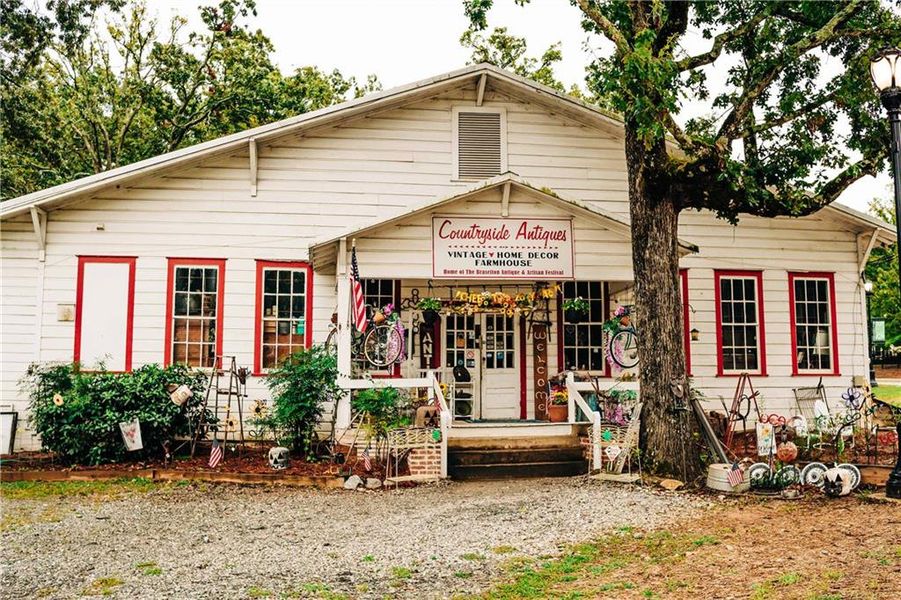 Front exterior of a new home in Rosewood Lake Estates, Hoschton, GA, highlighting curb appeal (Image 42).