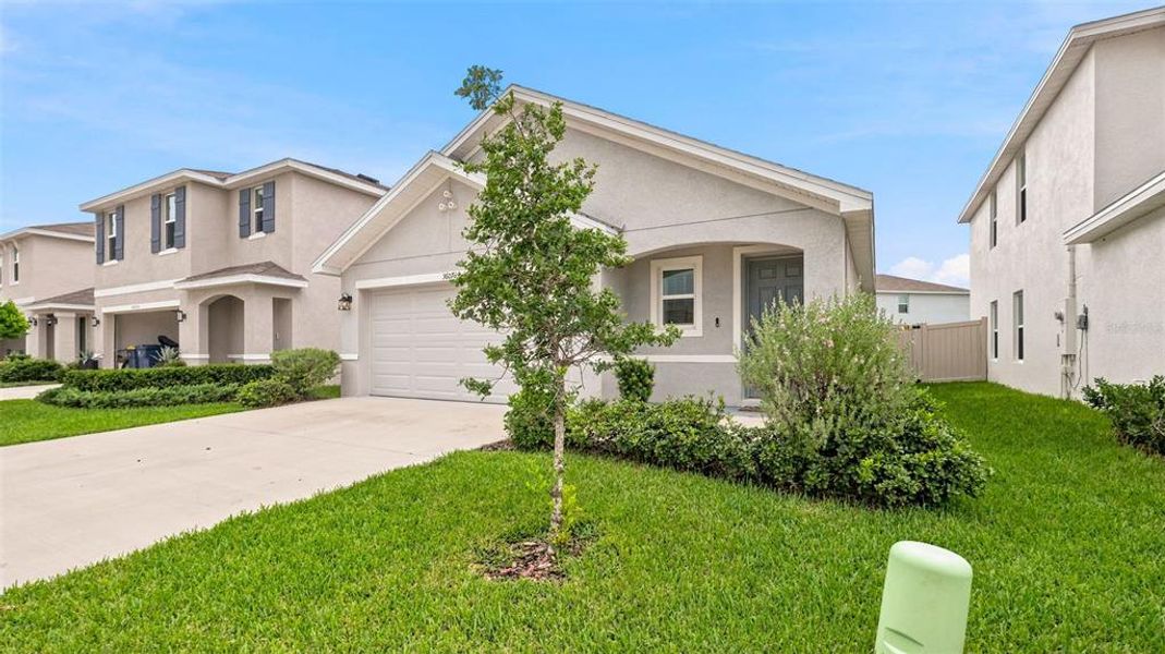 Front exterior of a new home in Northwater at Two Rivers, Zephyrhills, FL, highlighting curb appeal (Image 28).
