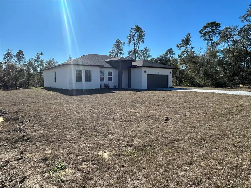 Exterior details and patio area of a home in , Ocala (Image 20).