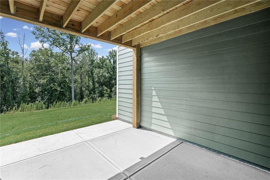 Exterior details and patio area of a home in Twin Lakes, Hoschton (Image 29).