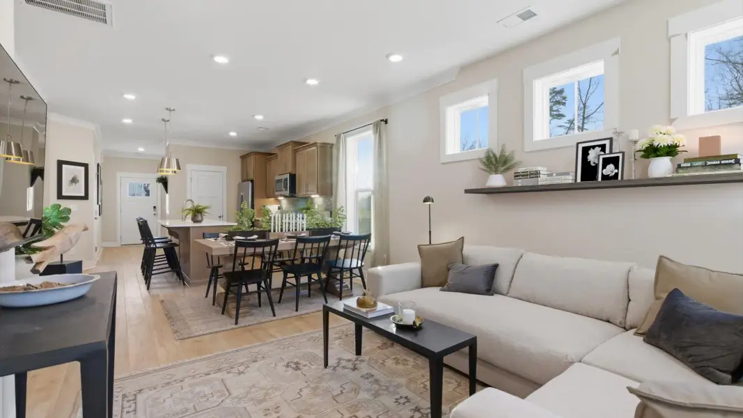 Superior design shines in this open-concept family room with timeless finishes and a modern edge at Pelham Crossing