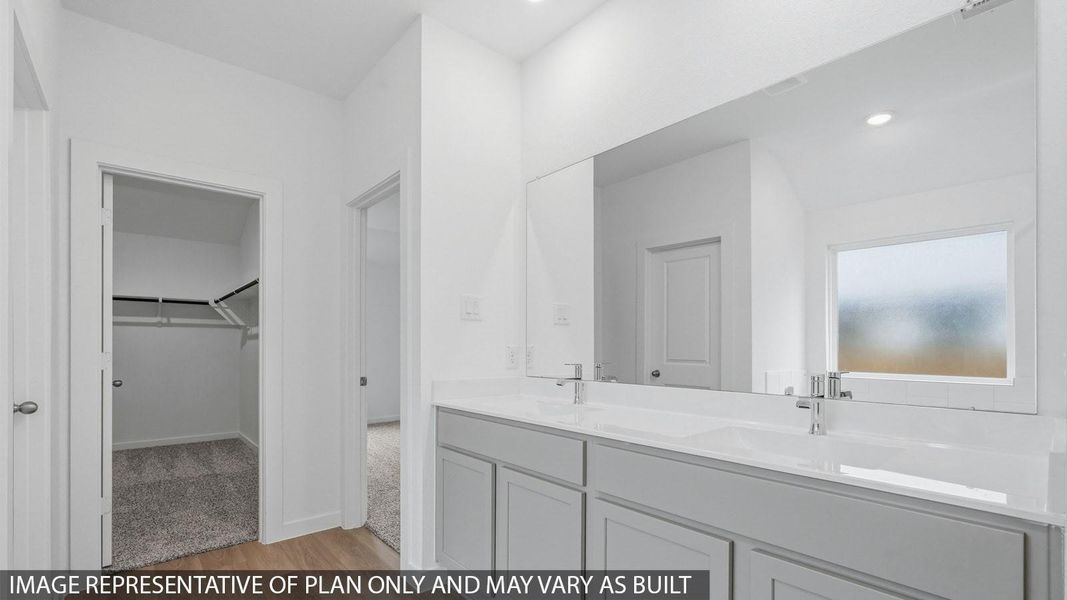 Furnished interior view inside a new home in Sunterra, Katy (Image 8).