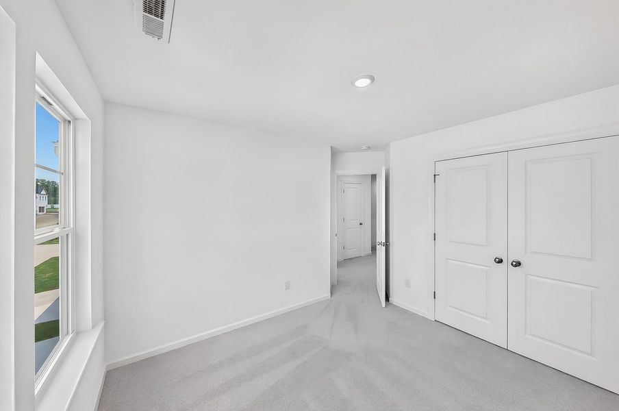 Spacious, unfurnished interior of a new home in Magnolia Townes, Wendell (Image 16).