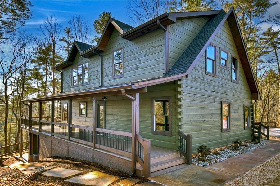 Exterior details and patio area of a home in , Ellijay (Image 29).