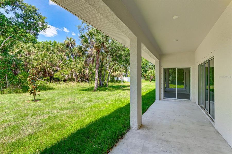 Exterior details and patio area of a home in , North Port (Image 21).