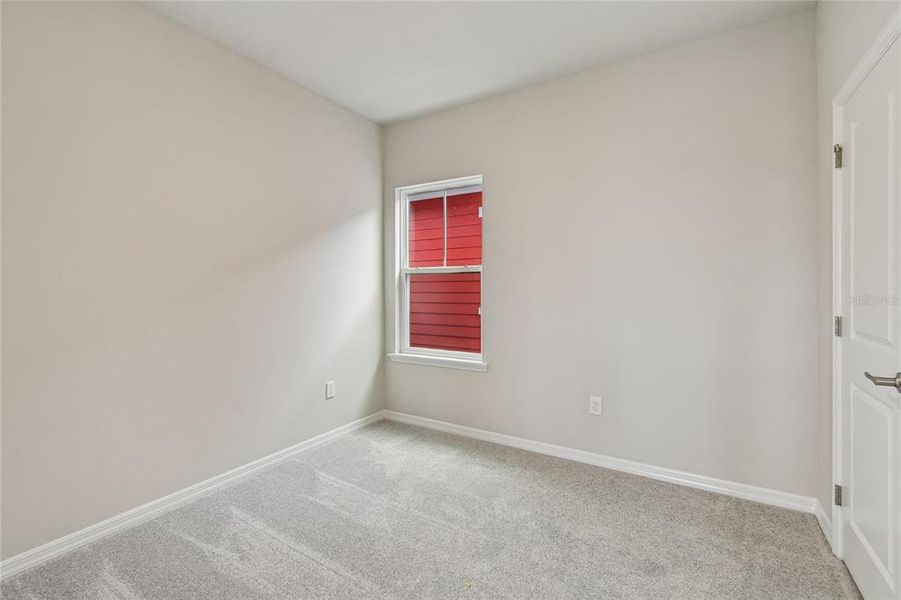 Spacious, unfurnished interior of a new home in Laureate Park at Lake Nona - Garden Series, Orlando (Image 30).