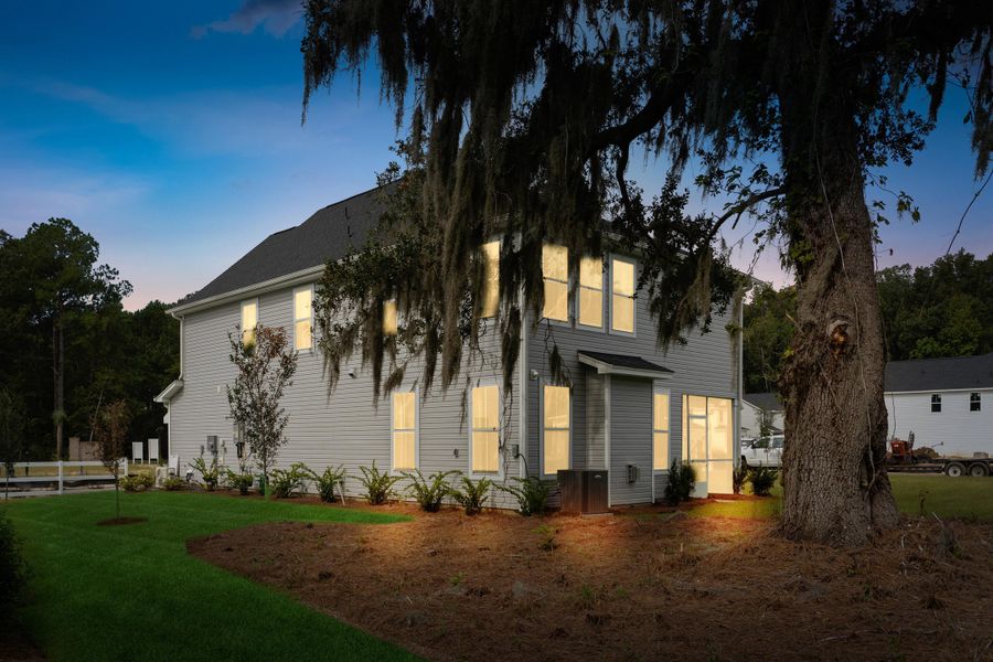 Front exterior of a new home in Sweetgrass Station, Summerville, SC, highlighting curb appeal (Image 2). Front exterior of a new home in Sweetgrass Station, Summerville, SC, highlighting curb appeal (Image 2).