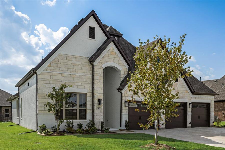 Front exterior of a new home in Heath Golf and Yacht, Heath, TX, highlighting curb appeal (Image 18).