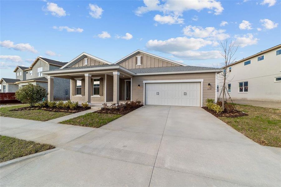 Front exterior of a new home in Calesa Township, Ocala, FL, highlighting curb appeal (Image 22).
