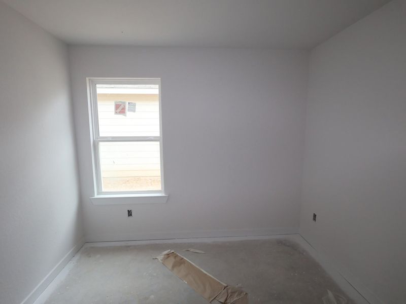 Spacious, unfurnished interior of a new home in Pinewood at Grand Texas, New Caney (Image 18).