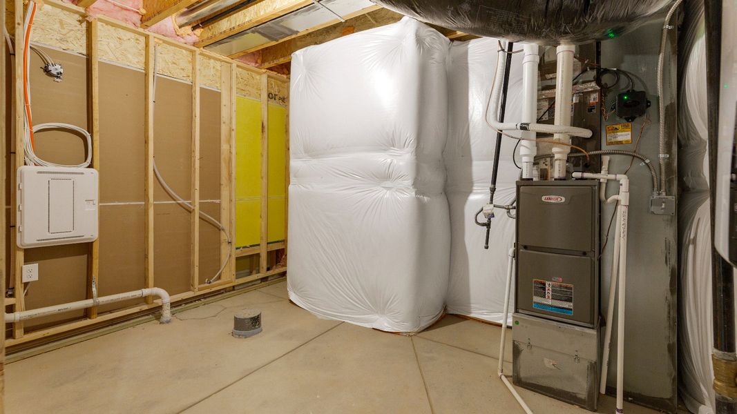 Furnished interior view inside a new home in Dillon Pointe - Journey, Broomfield (Image 22).