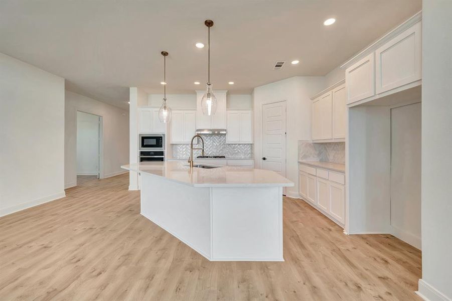 Furnished interior view inside a new home in Treeline, Justin (Image 7).