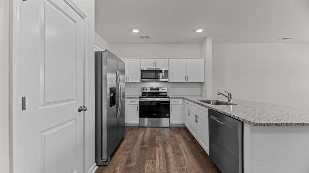 Representative furnished interior of a home built from the PEARSON II by D.R. Horton in Clock Road Townhomes, New Bern (Image 5). Representative furnished interior of a home built from the PEARSON II by D.R. Horton in Clock Road Townhomes, New Bern (Image 5).