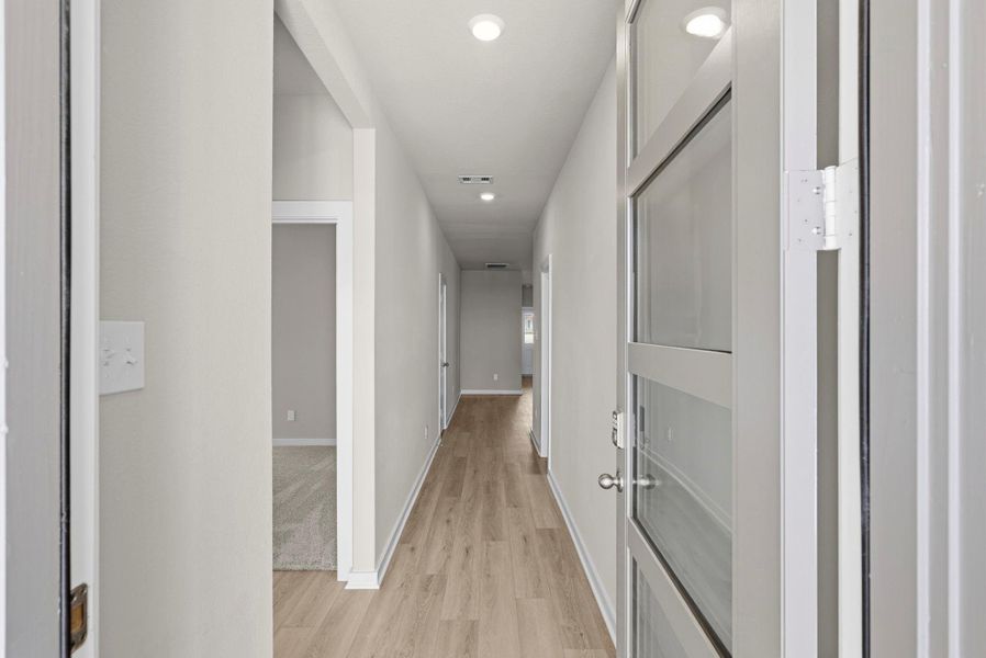 Spacious, unfurnished interior of a new home in Windrose Green, Angleton (Image 18).