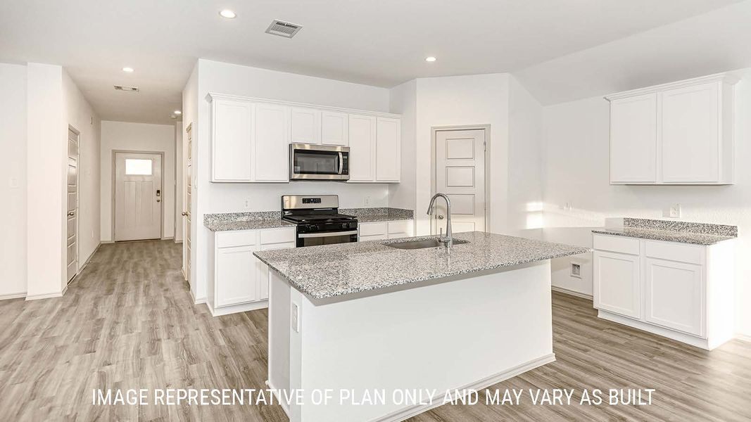 Furnished interior view inside a new home in Reserve at Mallard Lakes, Orange (Image 3).