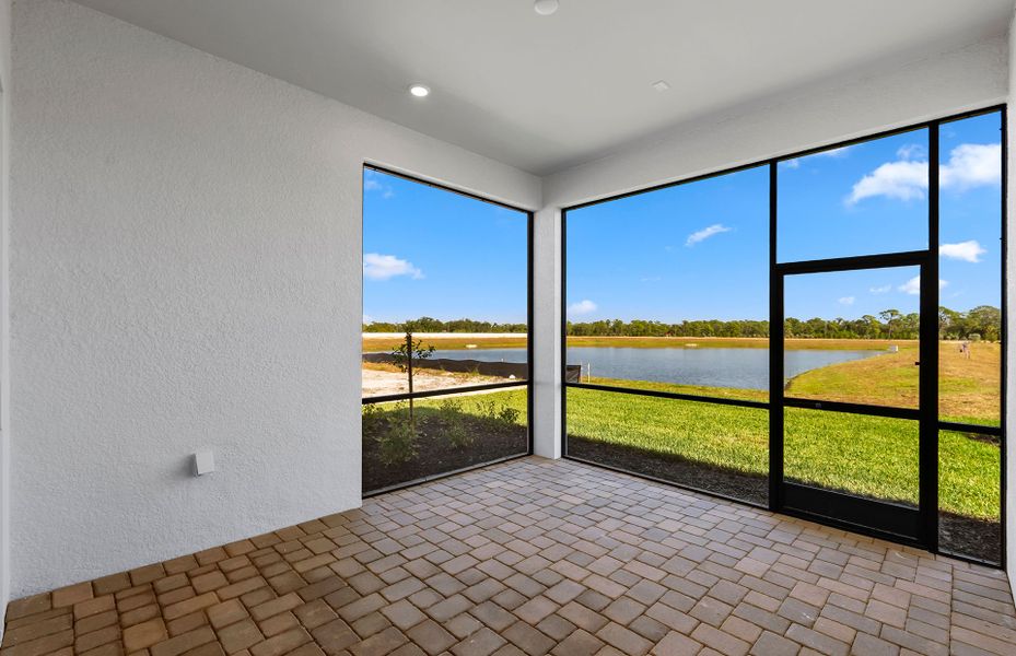 Exterior details and patio area of a home in Shores at Stillwater, Englewood (Image 3).