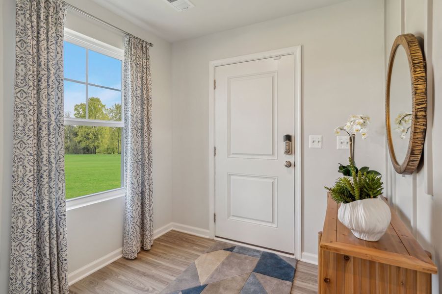 Representative furnished interior of a home built from the The Rutledge by Stanley Martin Homes in Essence at Trinity Townhomes, Columbia (Image 54).