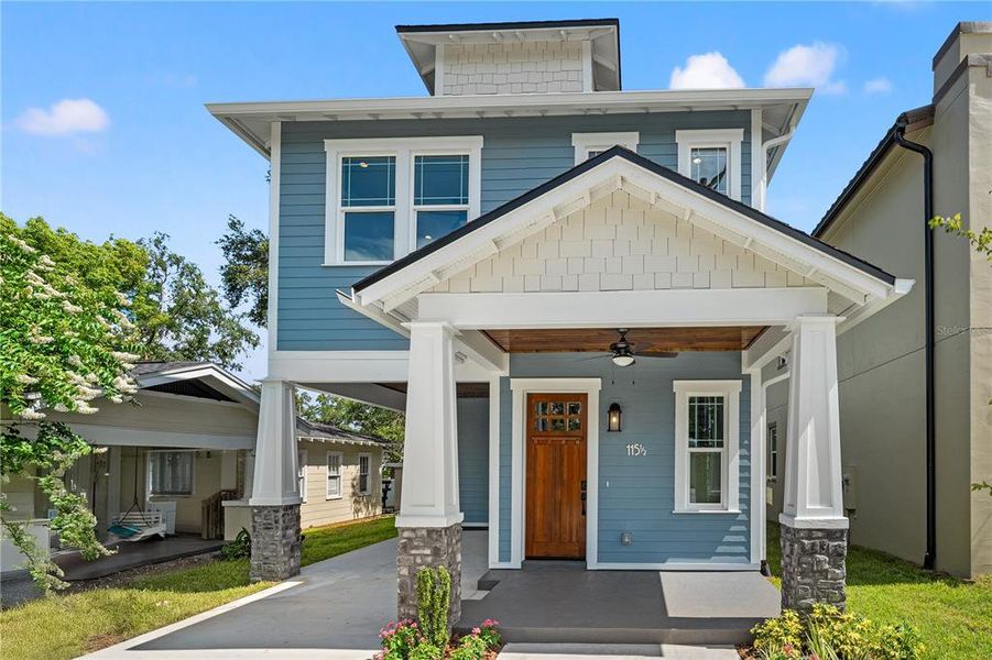 Front exterior of a new home in , Tampa, FL, highlighting curb appeal (Image 29).
