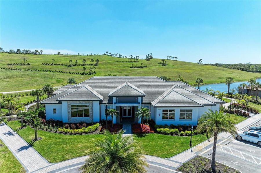 Front exterior of a new home in , Bradenton, FL, highlighting curb appeal (Image 23).