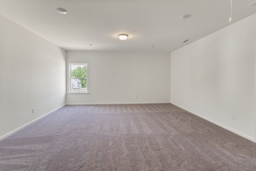 Spacious, unfurnished interior of a new home in The Exchange, Vass (Image 24).