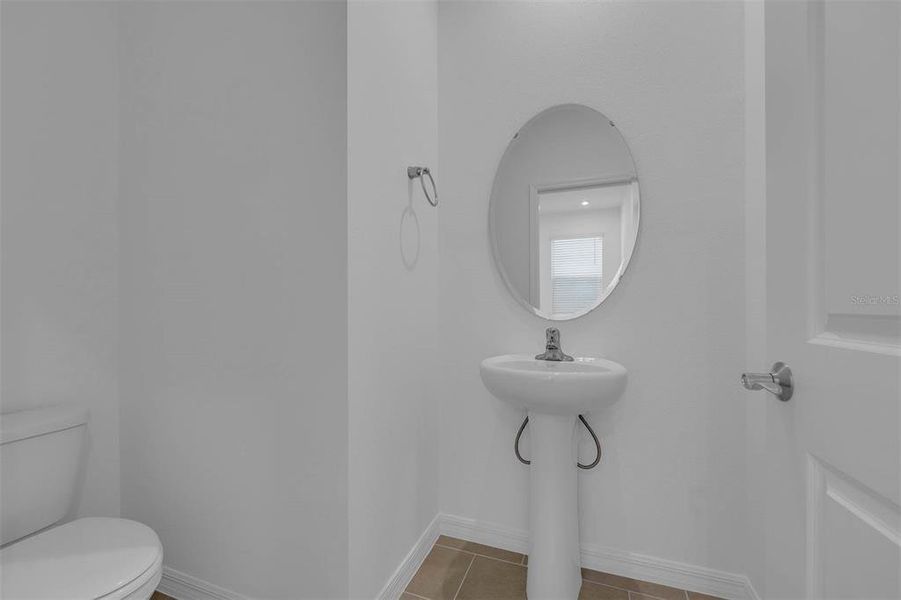 Furnished interior view inside a new home in Brack Ranch, St. Cloud (Image 12).