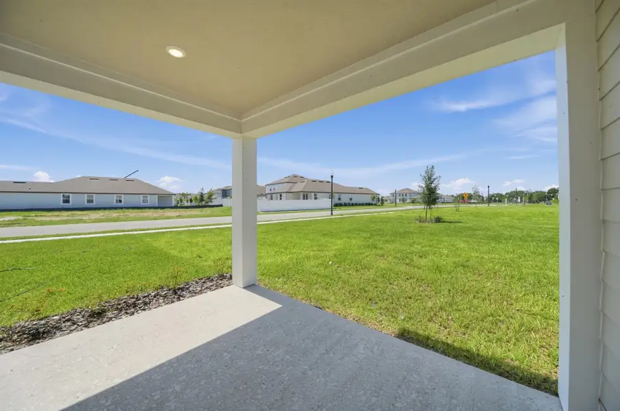 Exterior details and patio area of a home in Trailside, Mount Dora (Image 18).