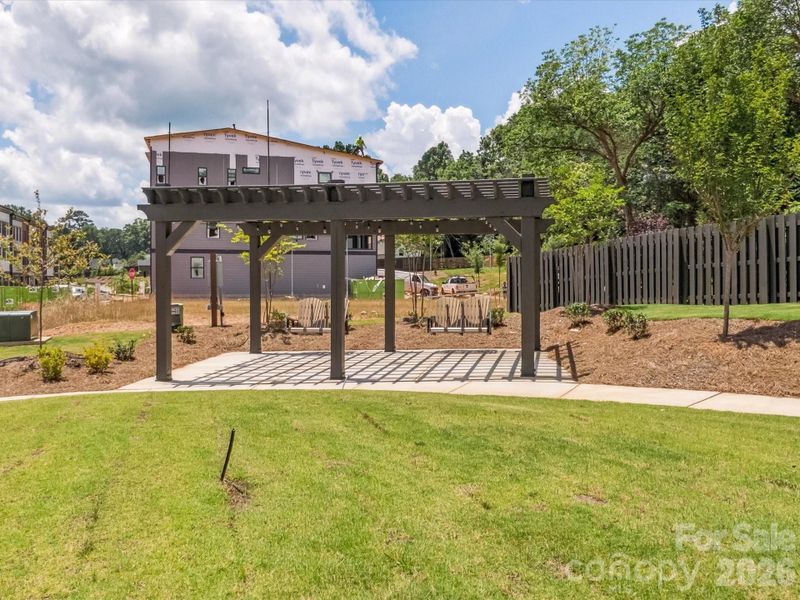 Community pavilion and swings so you don't have to leave the neighborhood to find a peaceful place to enjoy the warm summer days or cozy fall nights. *Model Photos | Actual orientation, structural selections, and finishes may vary.