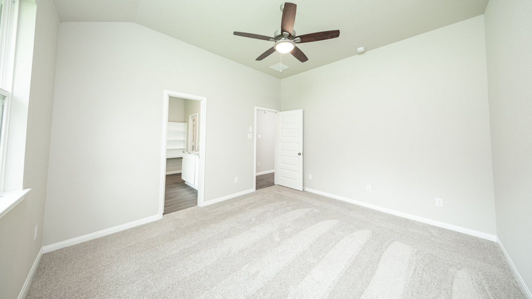 Representative unfurnished interior of a home built from the The Avola - Walden on Lake Conroe by Legend Homes in Lake Conroe Area Homes, Montgomery (Image 13).