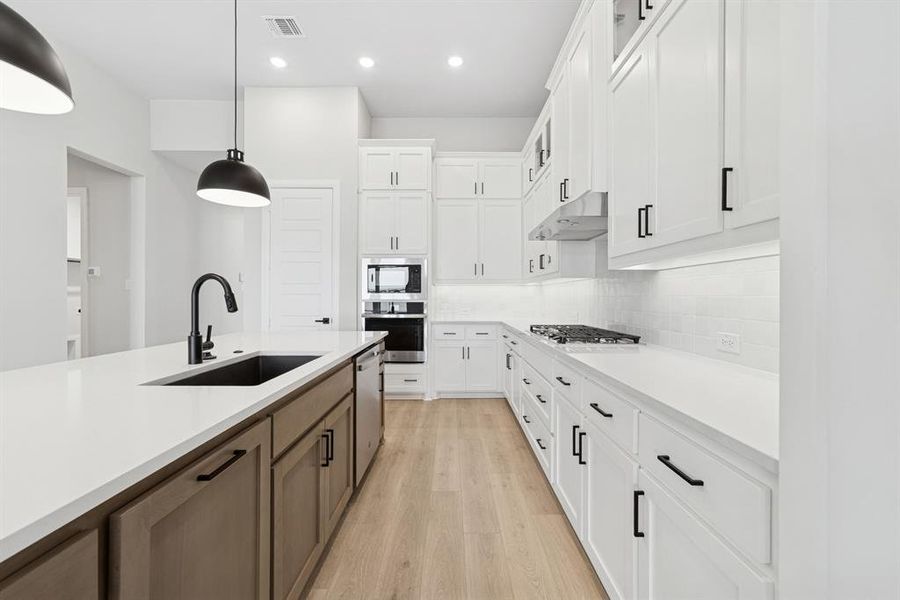 Furnished interior view inside a new home in Painted Tree - Classic Series, McKinney (Image 11). Furnished interior view inside a new home in Painted Tree - Classic Series, McKinney (Image 11).