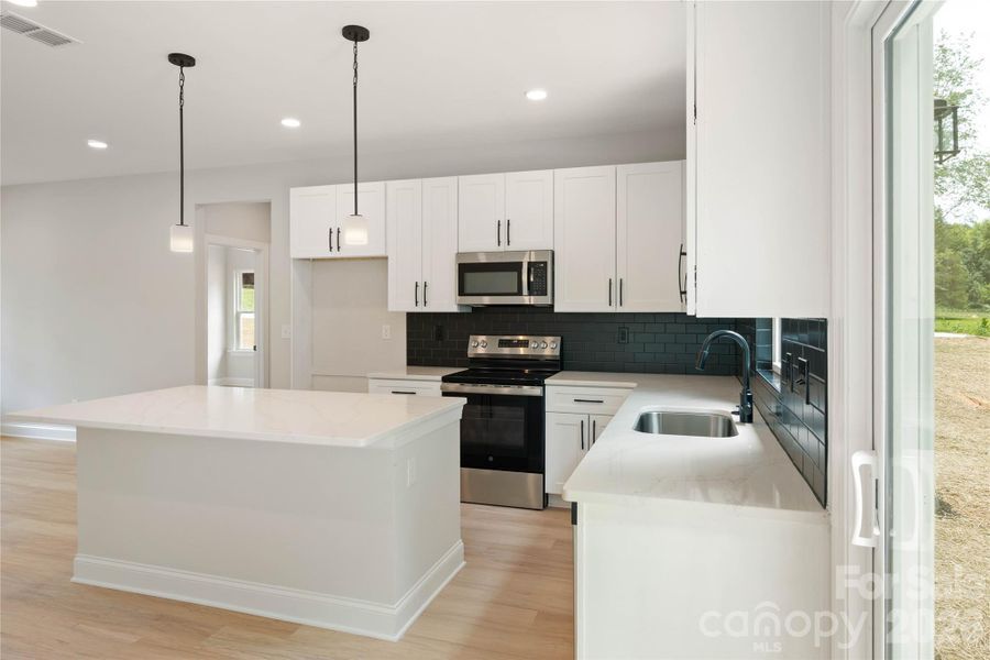 Furnished interior view inside a new home in , Stanley (Image 7).
