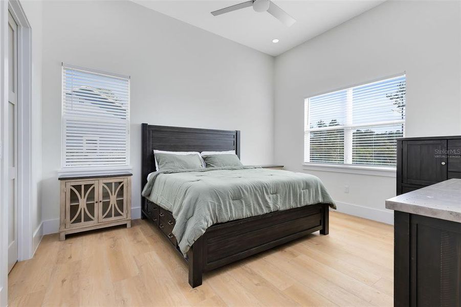 This photo has been virtually staged. A large bedroom in the casita also features a walk-in closet.