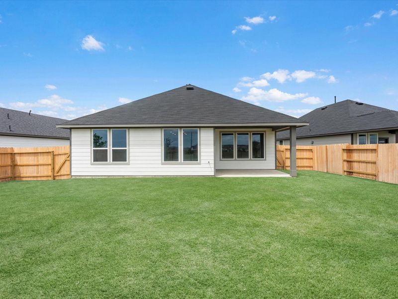 Exterior details and patio area of a home in Mason Woods, Cypress (Image 4).