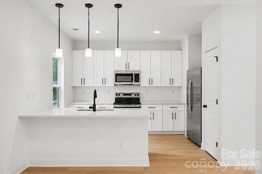 Furnished interior view inside a new home in , Charlotte (Image 4).