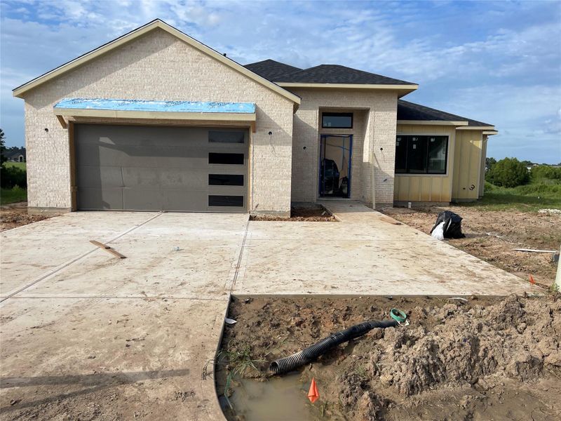 Front exterior of a new home in , Montgomery, TX, highlighting curb appeal (Image 29). Front exterior of a new home in , Montgomery, TX, highlighting curb appeal (Image 29).