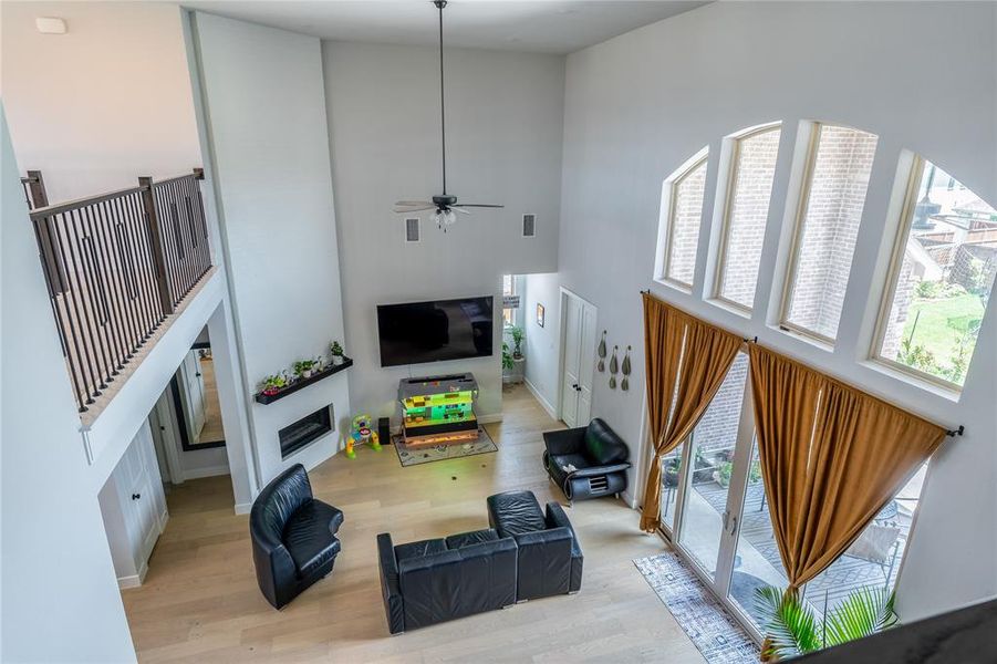 Hall featuring carpet floors, a chandelier, an upstairs landing, and recessed lighting