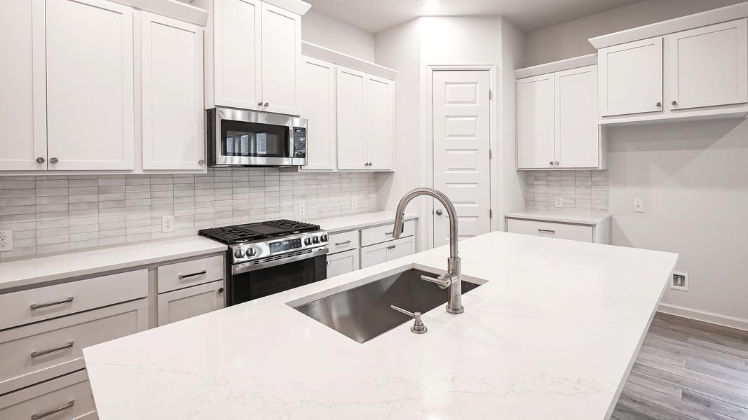 Furnished interior view inside a new home in Crosswinds, Kyle (Image 9).