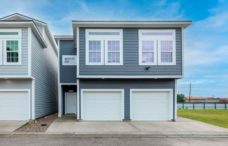 Front exterior of a new home in , Spring, TX, highlighting curb appeal (Image 2). Front exterior of a new home in , Spring, TX, highlighting curb appeal (Image 2).
