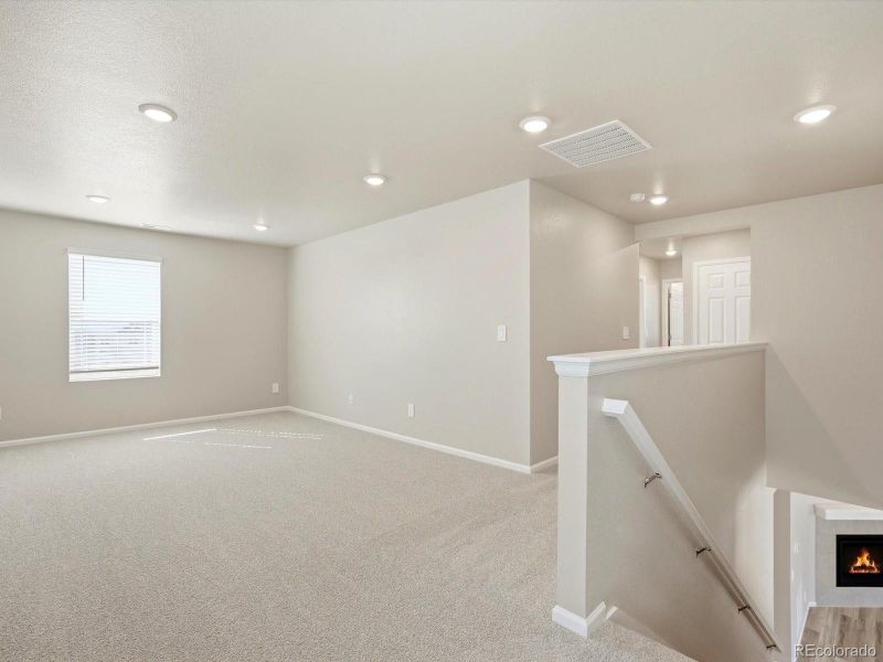 Spacious, unfurnished interior of a new home in Buffalo Highlands: The Flora Collection, Commerce City (Image 29).