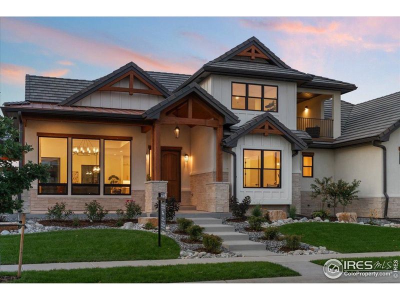 Front exterior of a new home in , Berthoud, CO, highlighting curb appeal (Image 19). Front exterior of a new home in , Berthoud, CO, highlighting curb appeal (Image 19).