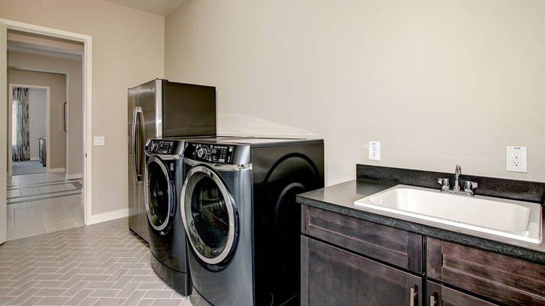 Representative furnished interior of a home built from the Shire by Taylor Morrison in Victory at Verrado Venture II Collection 55+, Buckeye (Image 32).