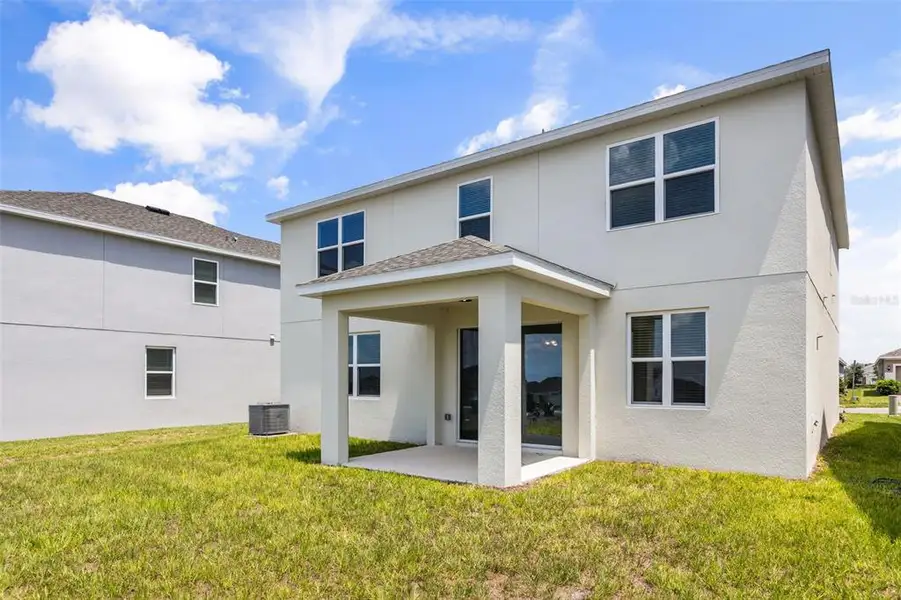 Exterior details and patio area of a home in , Groveland (Image 22).