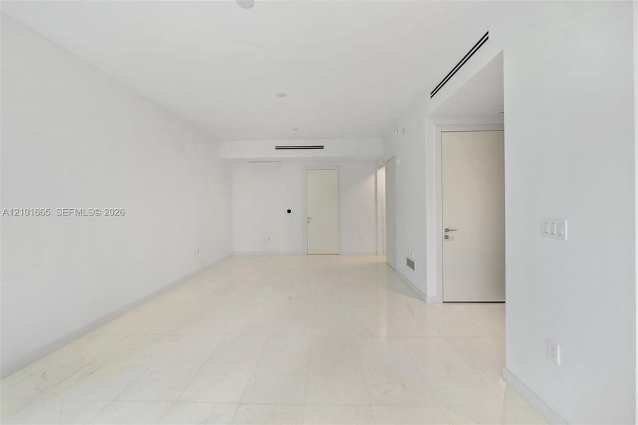 Spacious, unfurnished interior of a new home in Aston Martin Residences, Miami (Image 20).