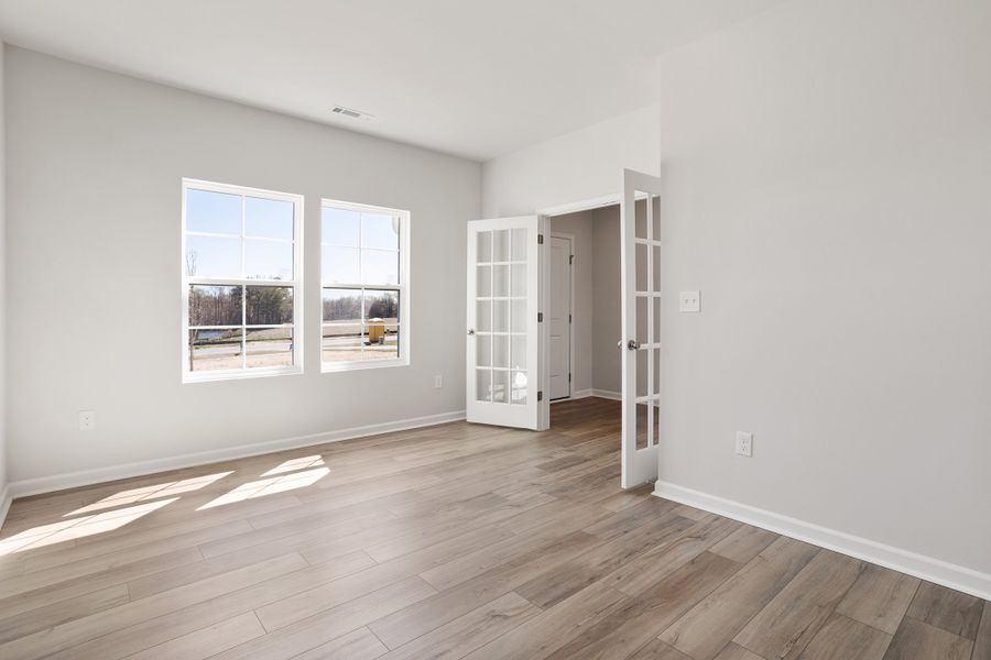 Spacious, unfurnished interior of a new home in Cambridge Reserve, Angier (Image 18).