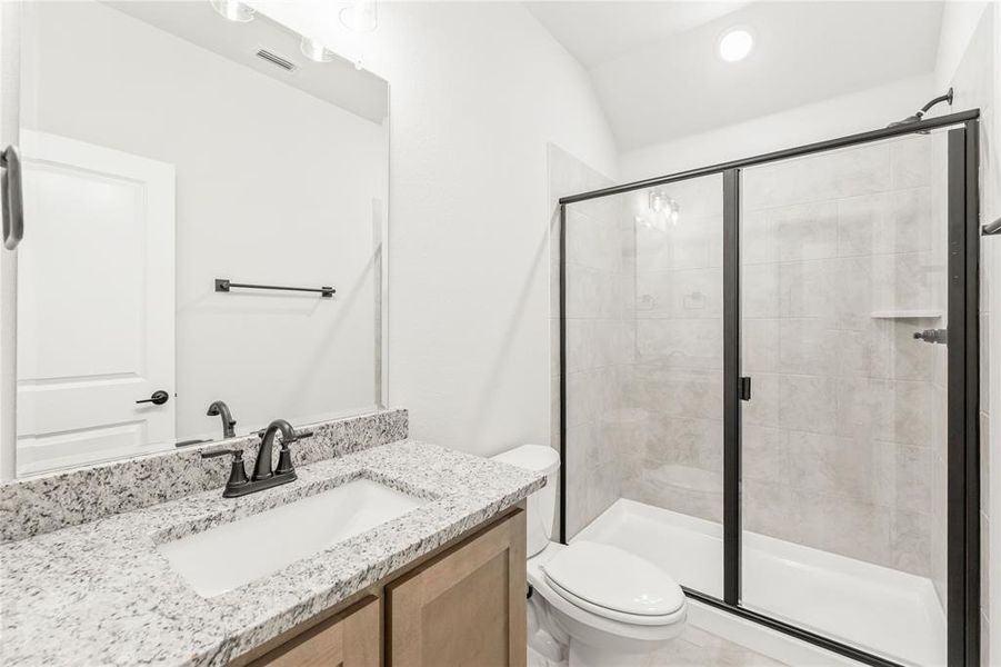 Furnished interior view inside a new home in Stone River Glen, Royse City (Image 14).