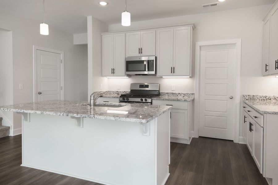 Representative furnished interior of a home built from the The Ivory by Cothran Homes in Holly Ridge, Greenville (Image 10).