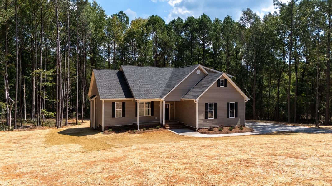Front exterior of a new home in , Chester, SC, highlighting curb appeal (Image 24).