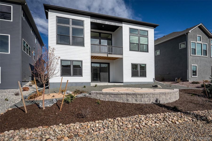 Exterior details and patio area of a home in Cloverleaf - Pinnacle Collection, Monument (Image 26).