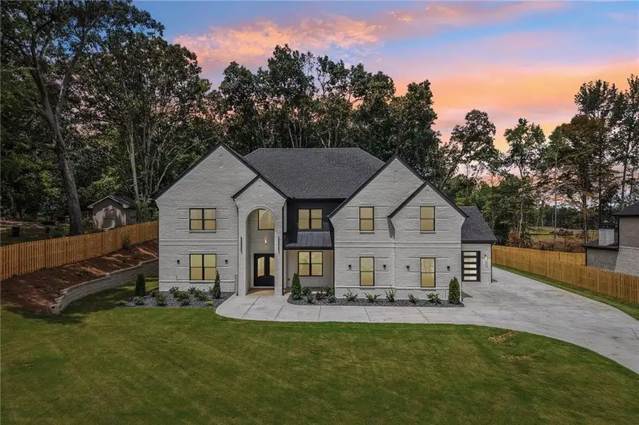 Front exterior of a new home in , Hoschton, GA, highlighting curb appeal (Image 29).