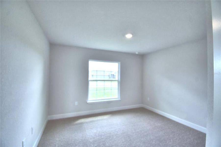 Spacious, unfurnished interior of a new home in Cadence Crossing, Auburndale (Image 25).